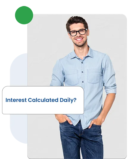 Man beside loan information card about daily interest calculation